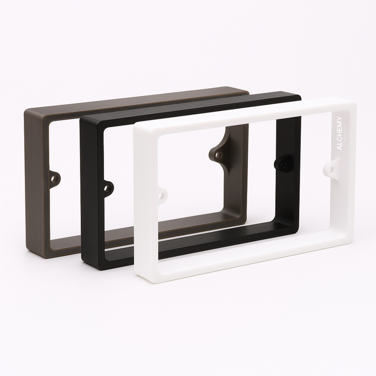Grey, black and white 2-gang socket spacers angled to show the 146 x 86mm profile